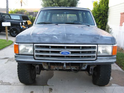 1986 Ford Bronco - The front grille and headlight design suggest a 1987 model year, not 1986.