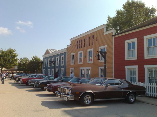 Brown 1975 coupe parked in front of Sheriff's building