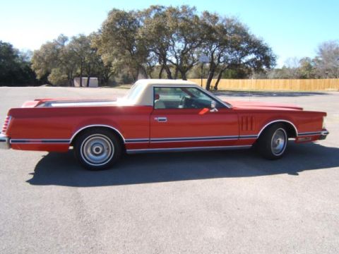 1972 Ford Ranchero - This 1977 Mercury Cougar XR-7 coupe utility features a distinctive red exterior with a tan vinyl top.