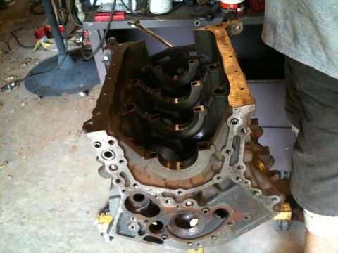 1993 Toyota 4Runner - An engine block is shown disassembled in a workshop setting.