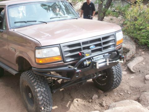 1993 Ford Bronco - This 1993 Ford Bronco is equipped with a winch and off-road tires, ready for terrain.