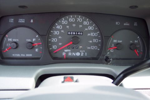 2001 Ford Crown Victoria - The dashboard gauges display the odometer reading of 029146 miles and other vehicle information.