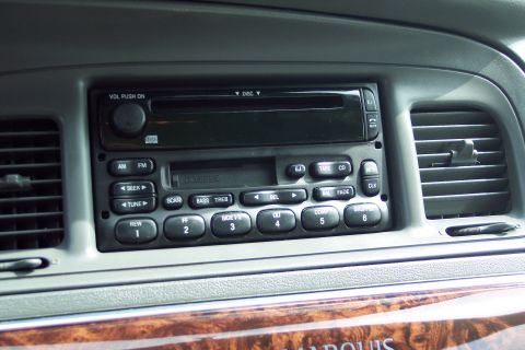 2001 Ford Crown Victoria - Dashboard interior the car's radio and air conditioning vents.