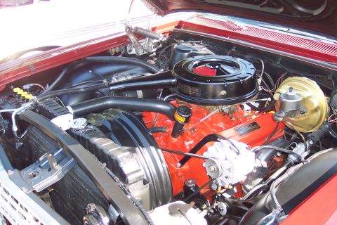 2001 Ford Crown Victoria - Close-up view of a classic car's engine compartment, showing various components and wiring.