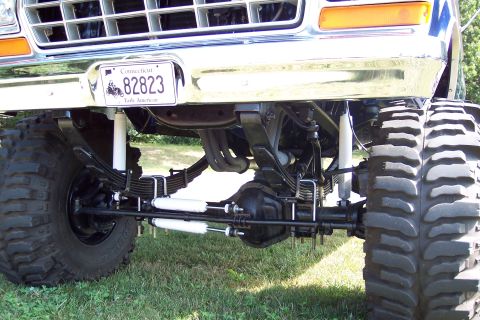 2001 Ford Crown Victoria - This modified truck features heavy-duty suspension components and oversized tires for off-road capability.