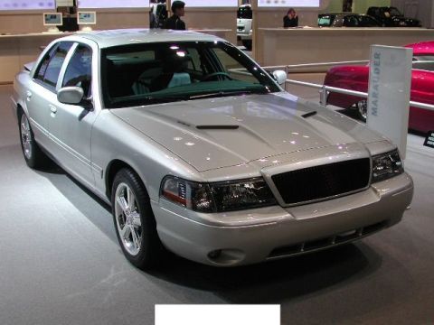 1900 Bentley Turbo - A silver Mercury Marauder is displayed indoors, possibly at a car show.