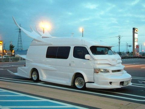 1900 Bentley Turbo - This heavily modified van features an elaborate body kit and aerodynamic enhancements, drastically altering its original appearance.