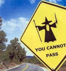 1900 Bentley Turbo - A road sign warns drivers with a wizard graphic and the message 'You Cannot Pass'.