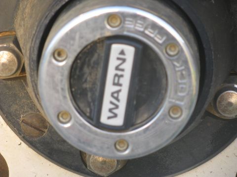 1979 Ford Bronco - This is a close-up of a Warn manual locking hub, not a 1979 Ford Bronco.