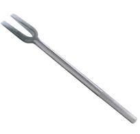 1989 Ford F-150 - A long-handled metal meat fork, designed for lifting and turning food during cooking.