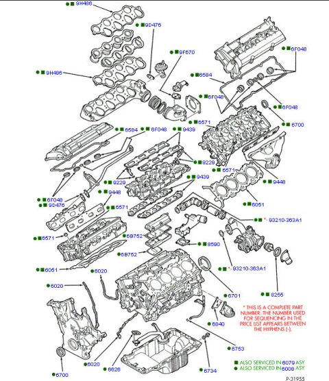 1997 Ford Taurus - Exploded parts diagram of an engine showing cylinder heads, manifolds, gaskets and block components with part numbers.