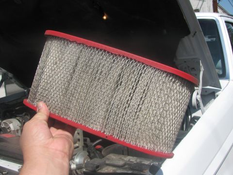 1996 Ford C-350 (Centurion Conversions) - Dirty air filter removed from engine bay.