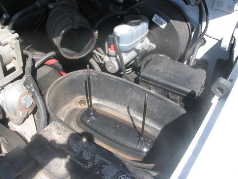 1996 Ford C-350 (Centurion Conversions) - Close-up view of the engine compartment, focusing on the air intake system and related components.