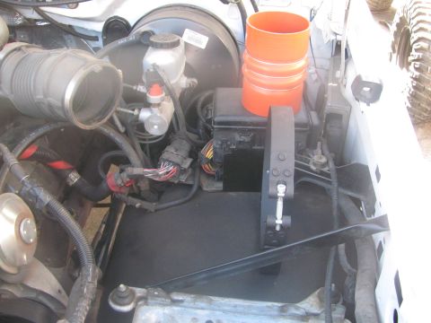 1996 Ford C-350 (Centurion Conversions) - Engine bay components including air intake, brake fluid reservoir, and fuse box are visible.