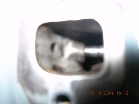 1996 Ford Bronco - This is a close-up view of an engine's cylinder head, showing internal ports. The photo was taken on August 16, 2009.