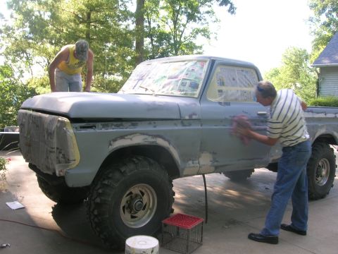 1975 Ford F-250 - Two men work on body repairs and prep for paint on a 1975 Ford F-250 truck.
