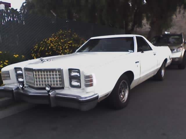 Front view of a white late-1970s Ford Ranchero in a driveway