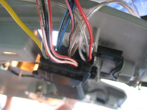 1993 Ford Probe - Vehicle wiring harness with many colored wires connected to a black connector block.