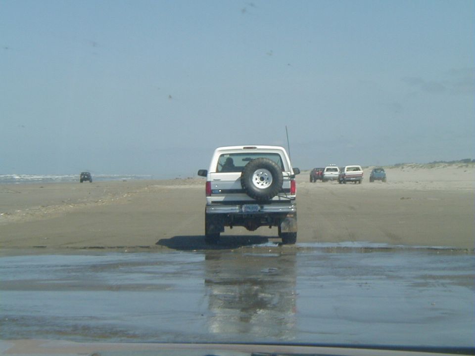 Driving along the beach. <br>(5/11/2002, by DK)