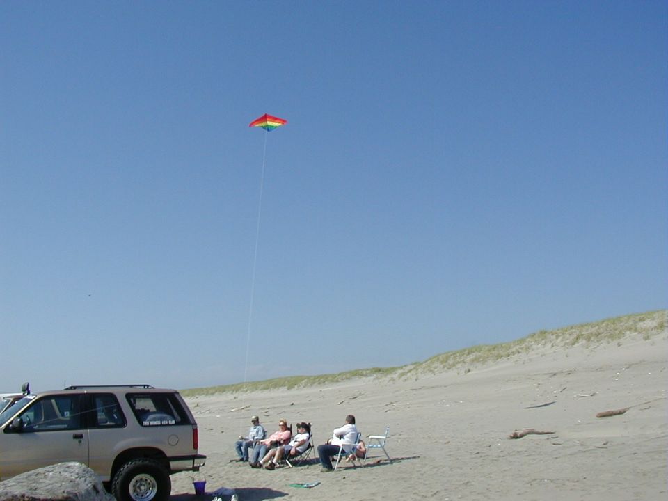 Kite flying and fun in the sun on the beach at Fort Stevens State Park. <br>(5/12/2002, by AK)