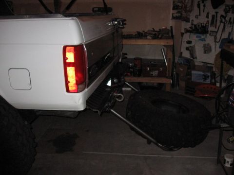 1995 Ford Bronco - Rear view of a 1995 Ford Bronco showing its spare tire carrier and tire.