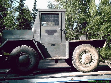 1978 Ford Bronco - This utilitarian vehicle has a utilitarian design, with a simple cab and a flatbed cargo area.