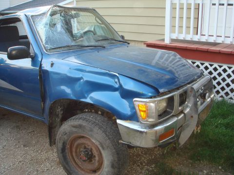1991 Toyota Tacoma - This 1991 Toyota Tacoma shows extensive damage to its front end and windshield.