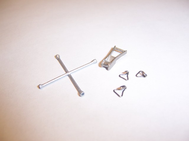 Lug wrench and jack parts on white background