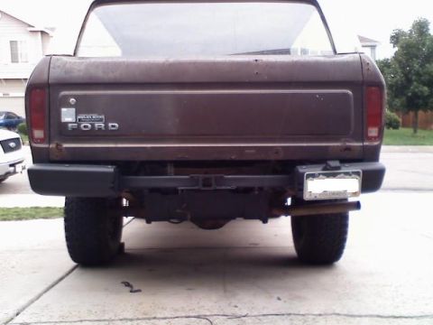 1979 Ford Bronco - Rear view of a 1979 Ford Bronco, showing the tailgate with Ford badging and a Colorado license plate.
