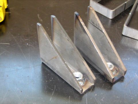 1996 Ford Bronco - These metal brackets with nuts appear to be custom fabricated parts.