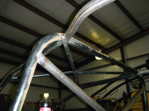 1978 Ford Bronco - Custom roll cage installation visible inside a vehicle's interior.