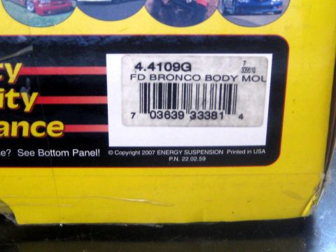 1996 Ford Bronco - A label with a barcode and product information is visible on a yellow surface.
