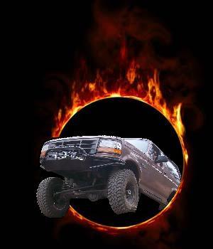1993 Ford Bronco - Ford Bronco with custom grille and lifted suspension, surrounded by fire effects.