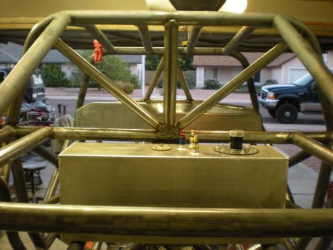 Suzuki Samurai - A custom tube chassis is shown with a large fuel tank and various fittings visible inside.