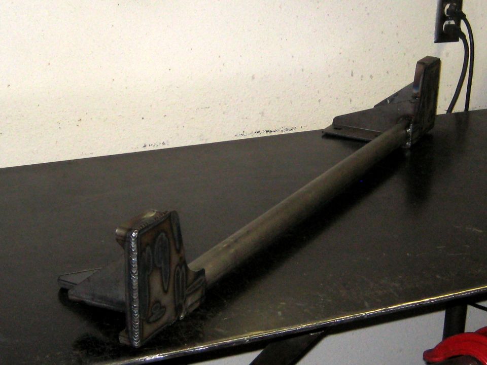 Custom front bumper part with welded square end and metal bar