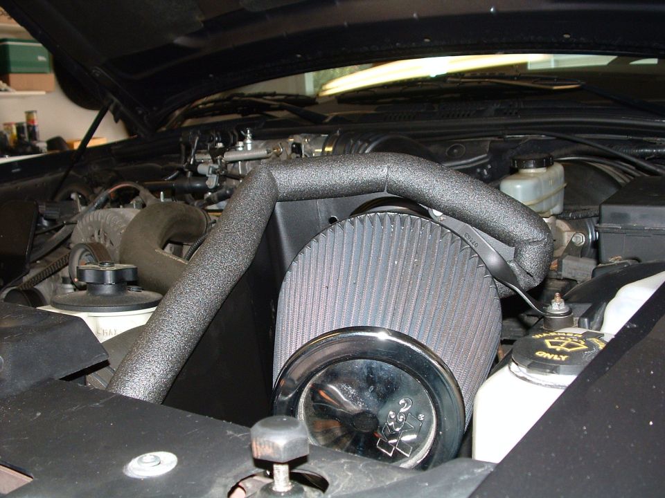 -7.5" K&N air filter.
-K&N Crown Victoria 2003 modifed heat shield.
-K&N Mercury Marauder filter adaptor.