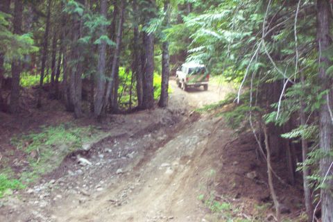 1996 Ford Bronco - Anne Knebel climbing a hill on trail to Ravens Roost. (7/13/2002)