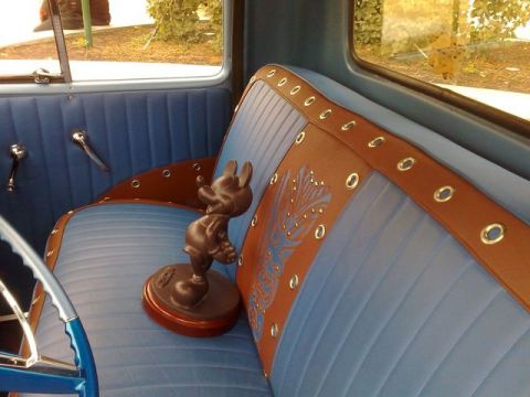 1991 Ford LTD Crown Victoria - Custom truck interior features blue seats with brown accents and a Mickey Mouse figurine. Supermotors.net logo is present.
