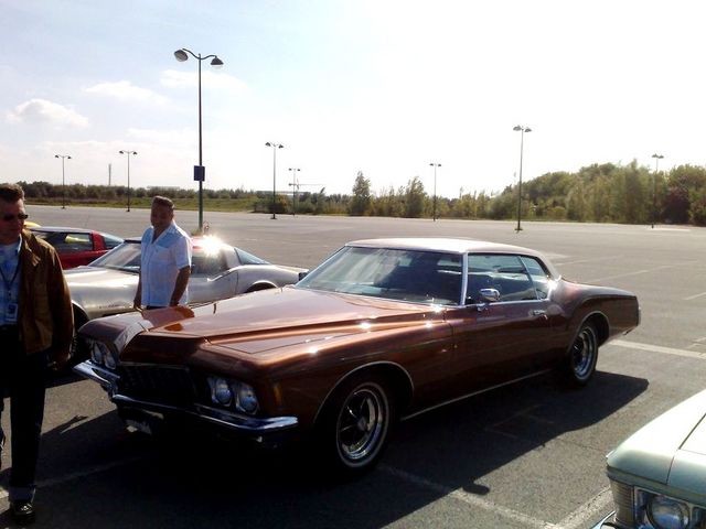 Brown 1971 Buick Riviera parked in a lot with other cars