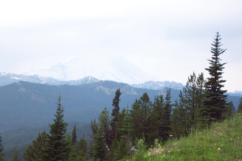Mount Rainier in the clouds.  <br>(View from Ravens Roost)<br>(7/13/2002)
