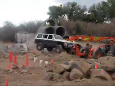 Ford Bronco - Old Jeep Cherokee being recovered after breaking some suspensions parts.