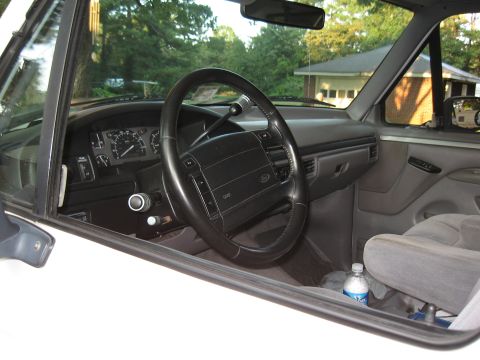 1994 Ford Bronco - Interior view of a 1994 Ford Bronco, the dashboard and steering wheel.