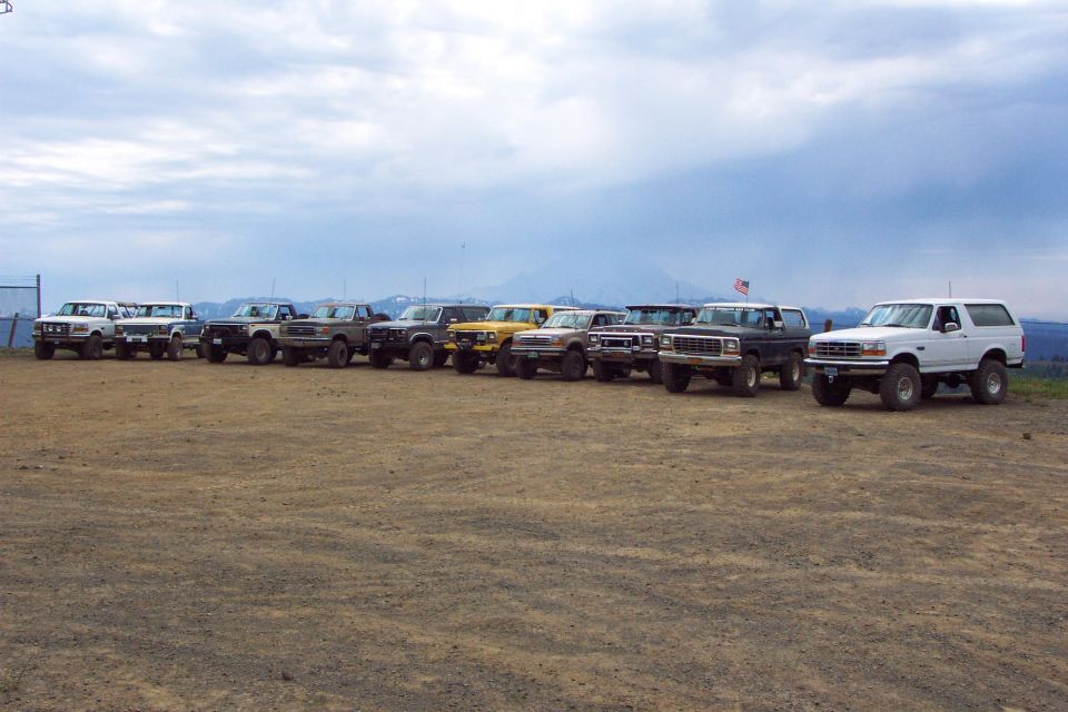 Group picture at top of Ravens Roost with cloud covered Mount Rainier in the background.  <br>(7/13/2002)