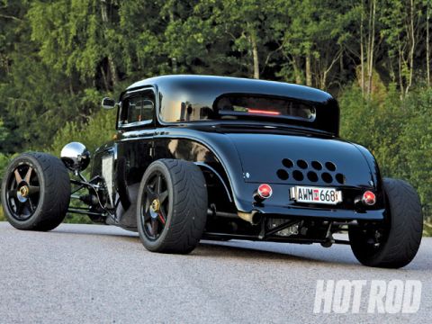 1984 Ford Bronco - Custom 1932 Ford coupe hot rod with a chopped roof and exposed engine components.