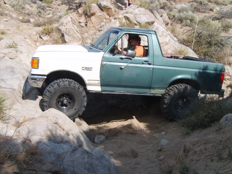 1989 Ford Bronco - This 1989 Ford Bronco navigates a challenging rocky trail with its two-tone paint scheme.