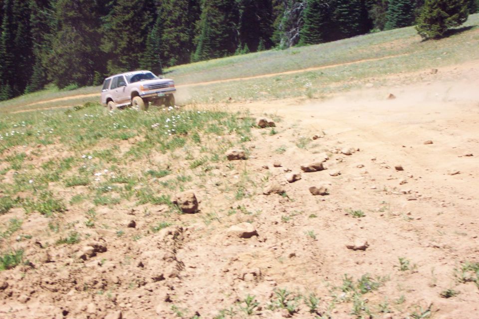 Anne Knebel on the hill climb to Funny Rocks/Moon Rocks.  <br>(7/14/2002)