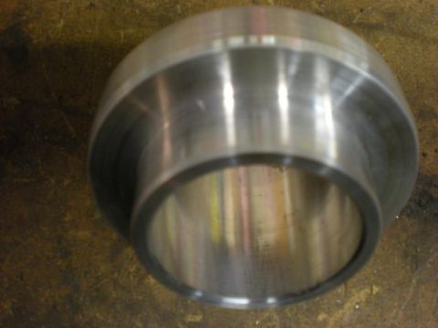Suzuki Samurai - A close-up view of a metal bearing part, likely for automotive use.