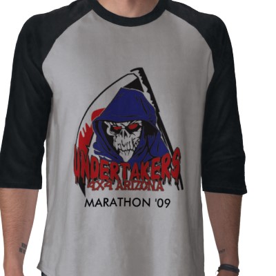 1966 Ford Bronco - A t-shirt displays a grim reaper graphic with event details, not a vehicle.