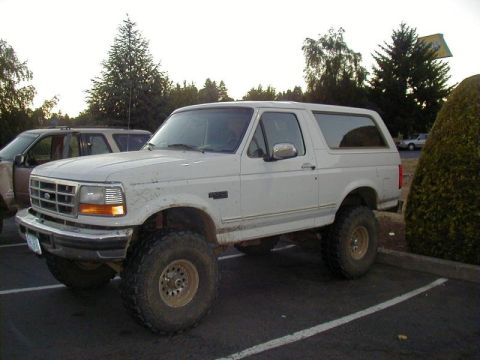 1996 Ford Bronco - Taking a Rest on the Way Home. (other side got the mud)(7/14/2002)