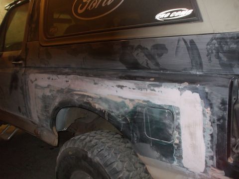 1995 Ford Bronco - drivers side with filler, ready for primer and paint